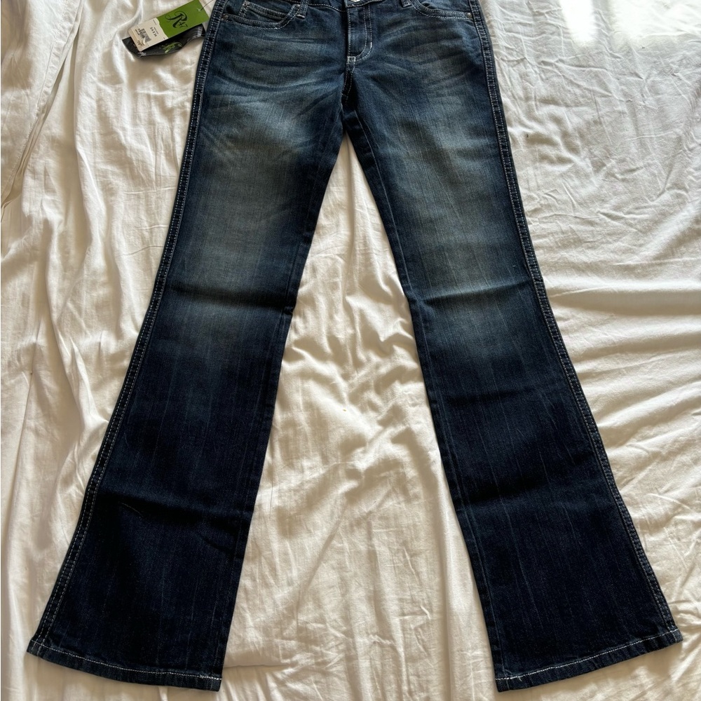 Rock 47. Size 4  34 inseam. Flared Jeans. Super flattering hot body showcasing